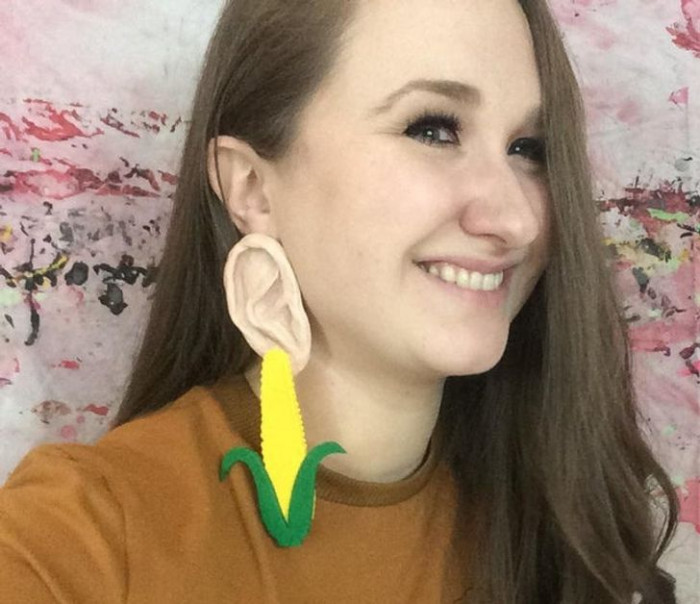 13. For her earrings, she made corn earrings.