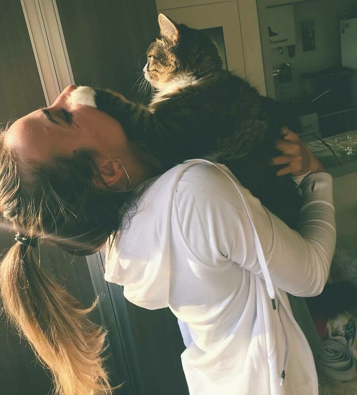 16. "This Hooman Loves to Kiss Me—and I Hate It. But She’s Been a Good Slave"