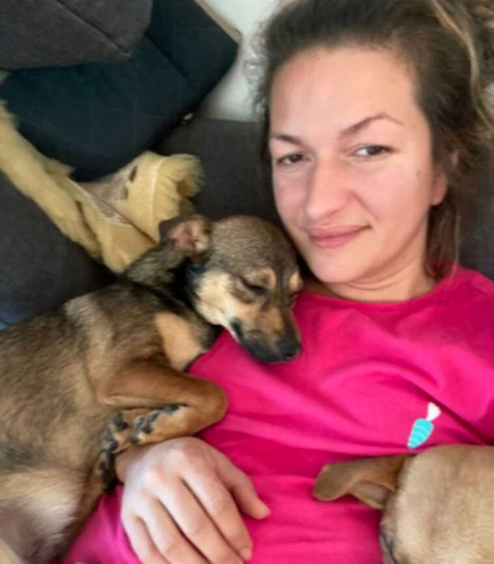 Here's Paula cuddling with her rescuer Georgiana Neagu