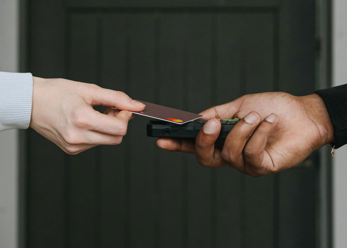 A company should be the one paying for dinner if it's for celebrating an accomplishment.