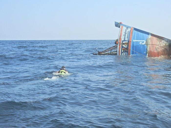 Thatsaphon Saii quickly put on a life jacket and swam 50 feet over to the boat.