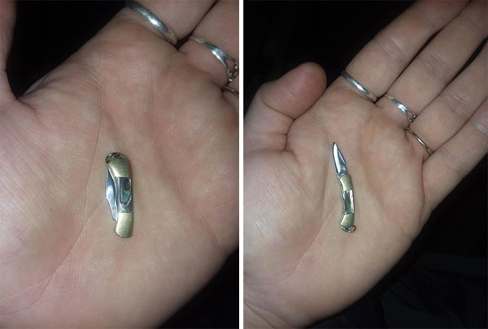 A mother-of-pearl handle on a tiny yet fully functional knife.