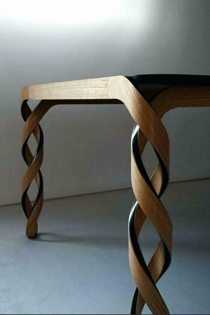 17. Double helix legs on a wooden table