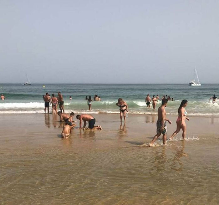 45. They're looking for their car keys that their kids buried in the sand