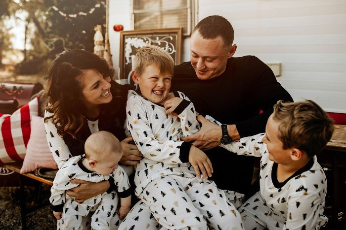 Ashley, her husband and her three boys. 