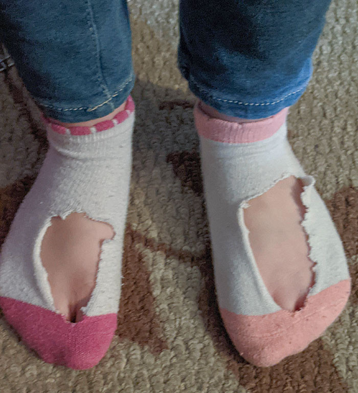 This 5-year-old cut holes in her socks to make sure her feet don't get too hot.