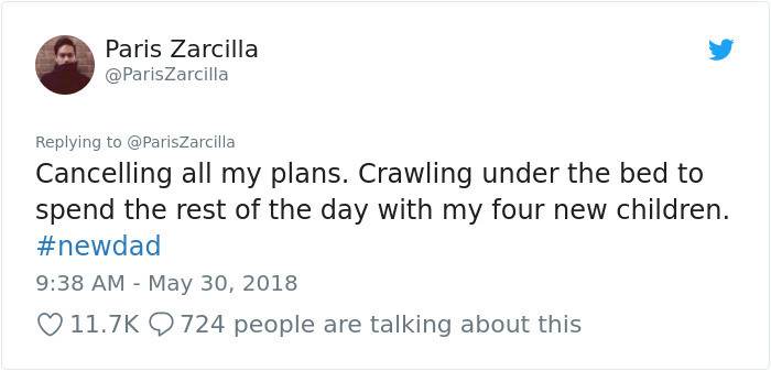 CatDad stands near newborn kittens in his room, surrounded by four babies