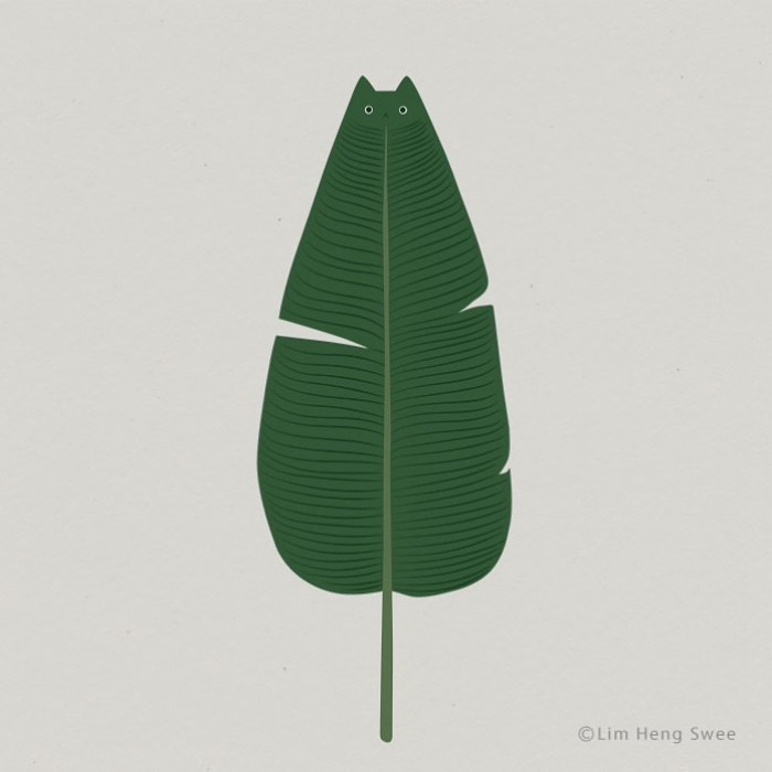 The artist cleverly combines a cat with the leaf's shape.