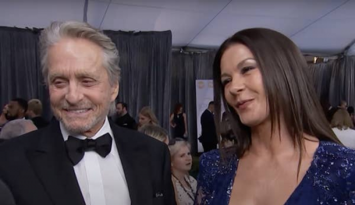 Michael Douglas vs. Catherine Zeta-Jones. Michael is the victorious one in the popularity poll.