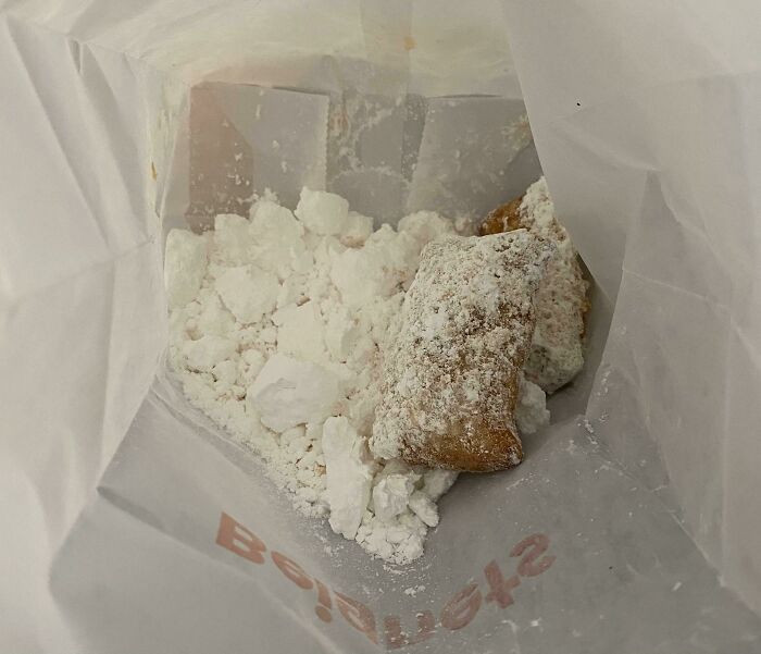27. Got a couple of beignets in this powdered sugar bag