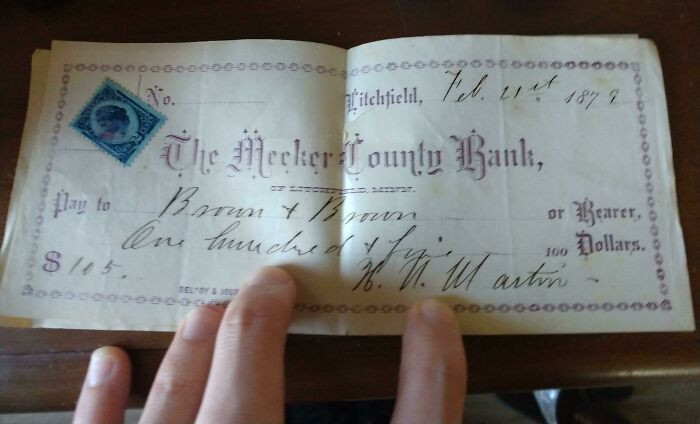 30. A check from 1879 for $105