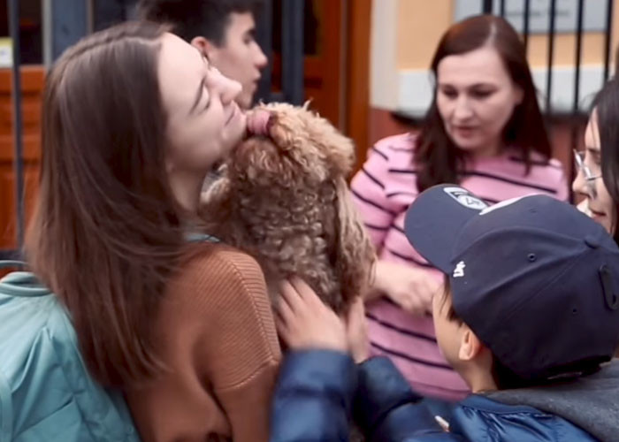 The family's pup is equally as happy to be reunited with his humans!