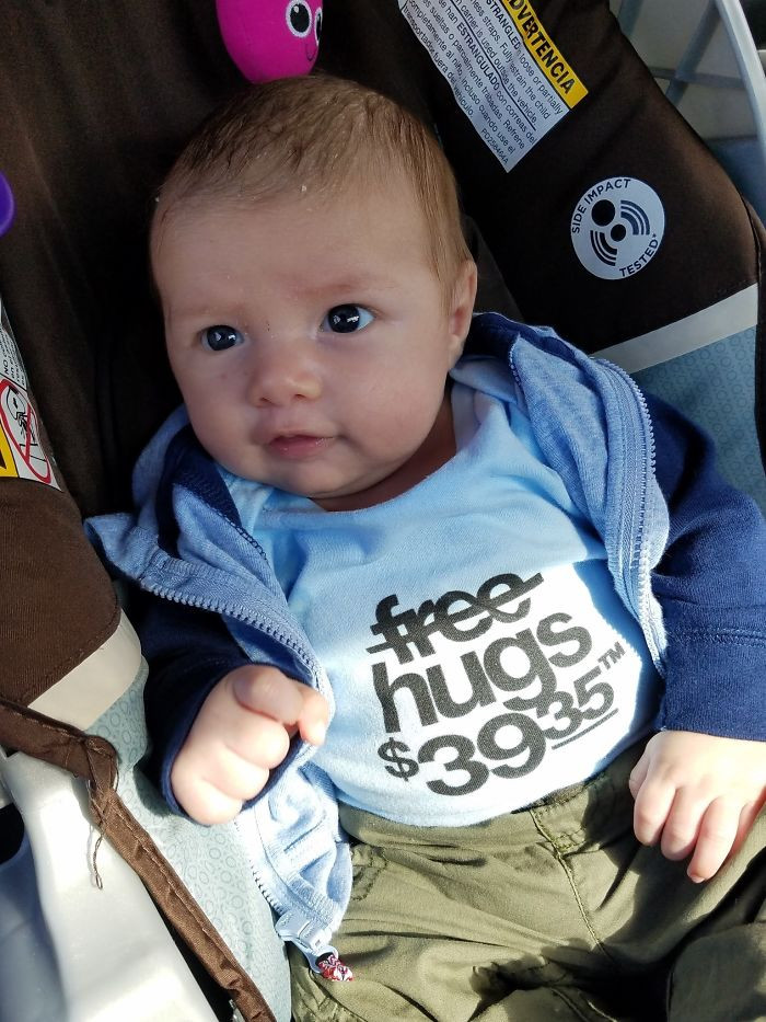 36. After being charged $39.35 to hug my son, here's his new favorite shirt