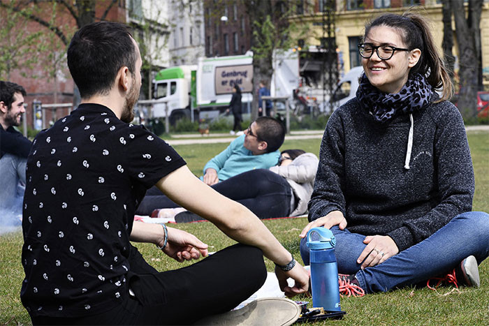 Photo 3 - Telephoto lens. Crowded park picnic.