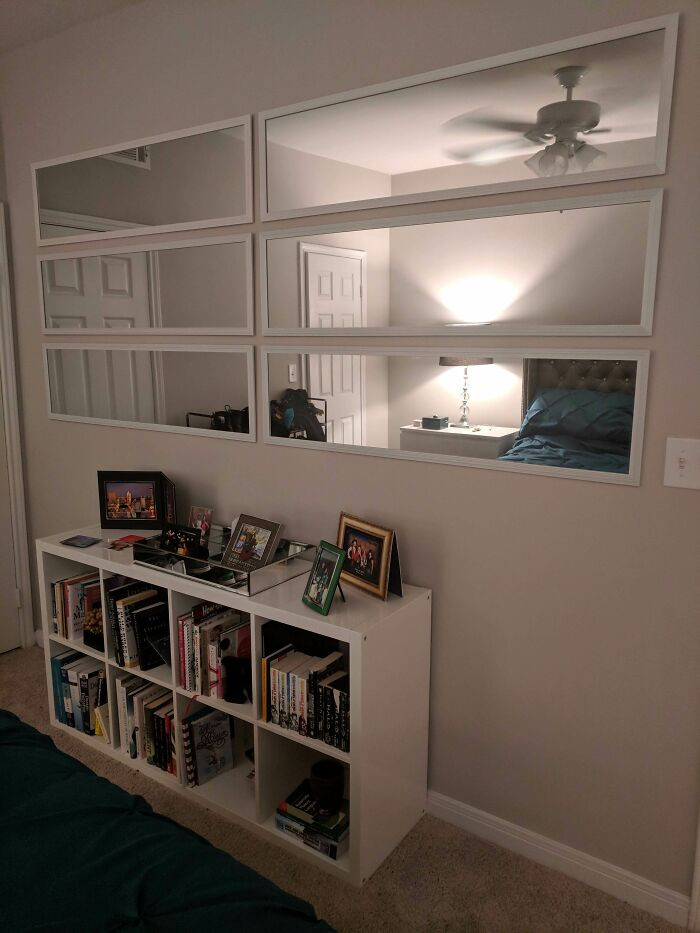 13. This couple found small cabinet mirrors as an alternative when they wanted to put up a large mirror on their wall.