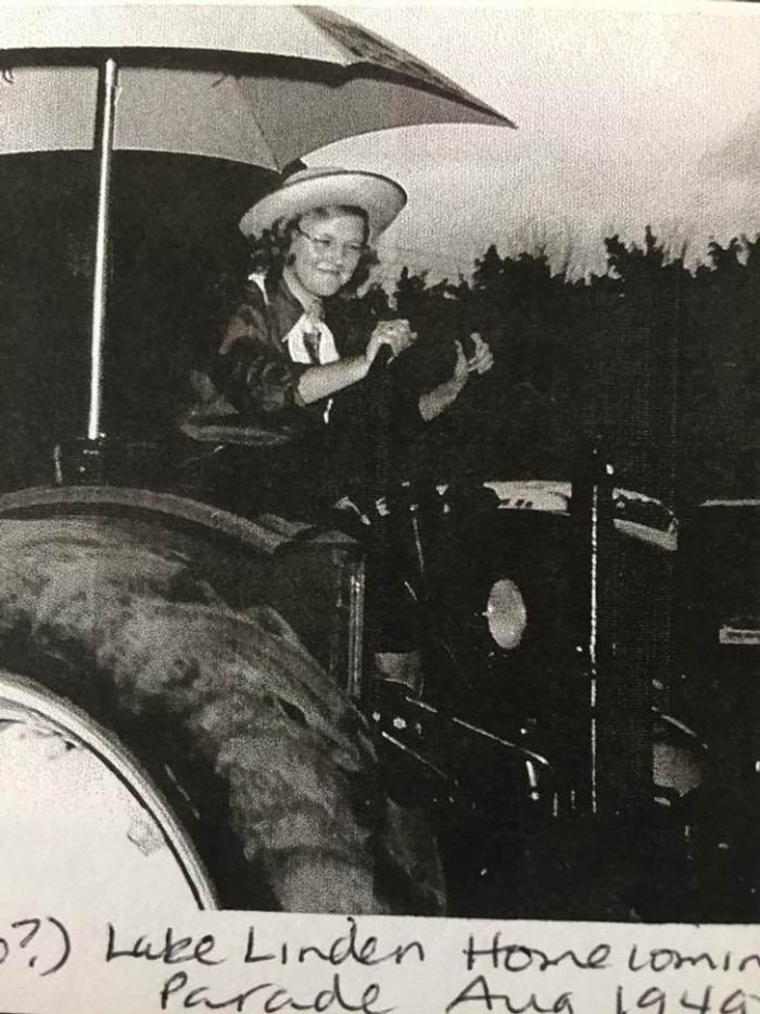 12. “My grandma driving a tractor in a parade, 1949”