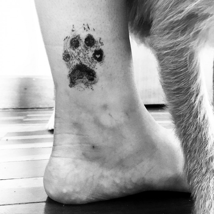 3. Paw tattoo on ankle