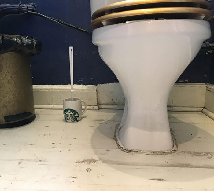 #2 Coffee Shop Uses a Starbucks Mug For It's Toilet Brush Holder