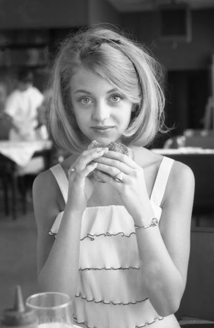 Accomplished actress Goldie Hawn seen here enjoying a burger