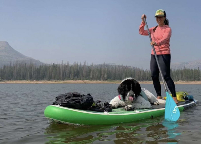 Maggie loved paddle boarding with her mom.