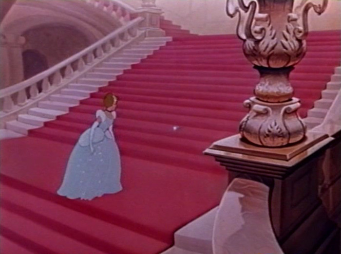 6. Here she has arms, her gown sparkles and shows detail and the stairs are royally red.