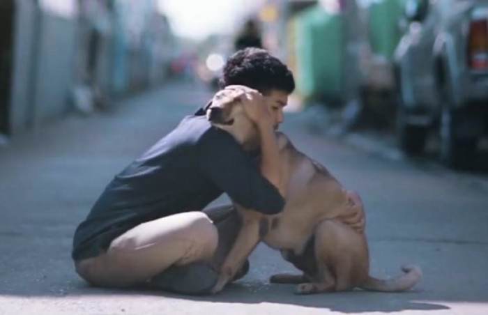 Under his project, 'The First Hug', stray dogs were given what may have been the first hugs of their entire lives.