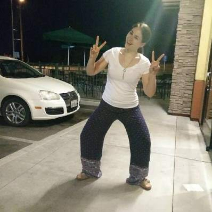 Man and cat pose together in a playful, weird Instagram style setup