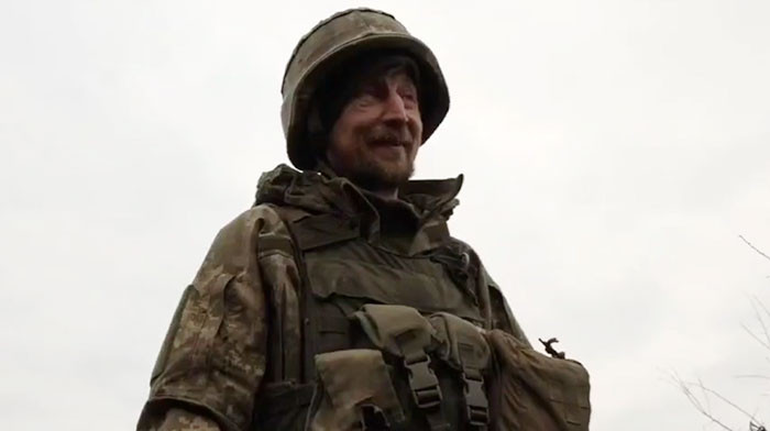 One of the soldiers admits that it's a time when it's difficult to smile. But they're glad that the puppy is with them, doing his job.