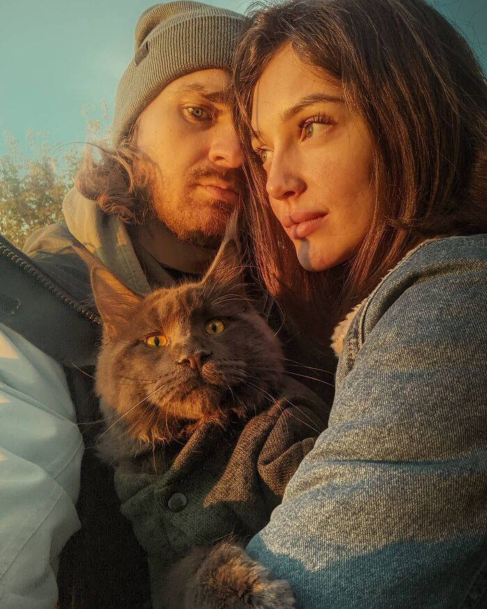 Here is Andrey, Anastasia, and their huge cat named Vincent, all from Russia