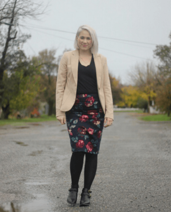 Man and cat wearing matching outfits, featuring standout pants in recreation