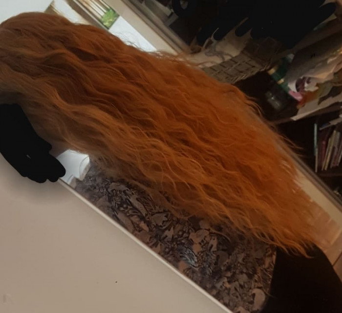 She included this photo of her naturally long hair 