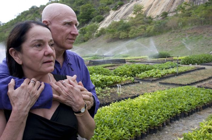 The couple are Brazilian photographer Sebastião Salgado and his wife Lélia Deluiz Wanick Salgado. They have decided  to reduce the damage done by deforestation by re-planting some of the trees. 