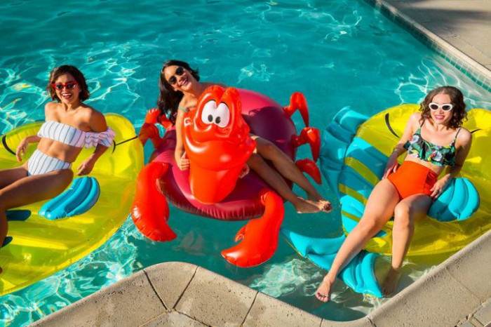 Disney and mermaid fans alike will be pleased to hear that Disney has teamed up with Oh My Disney and launched an entire line of summer wear and pool accessories dedicated to The Little Mermaid.