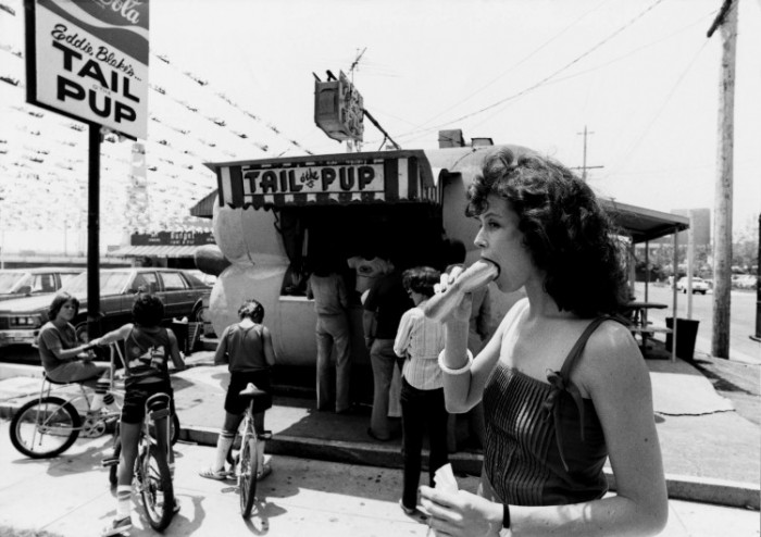 Actress Sigourney Weaver enjoying a hot dog