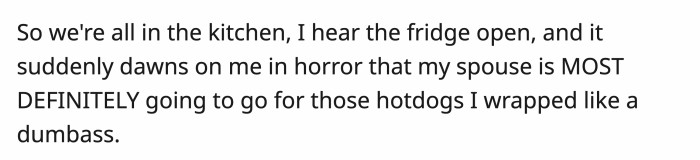 Dog looks surprised and curious, following owners' spill involving hotdog water.