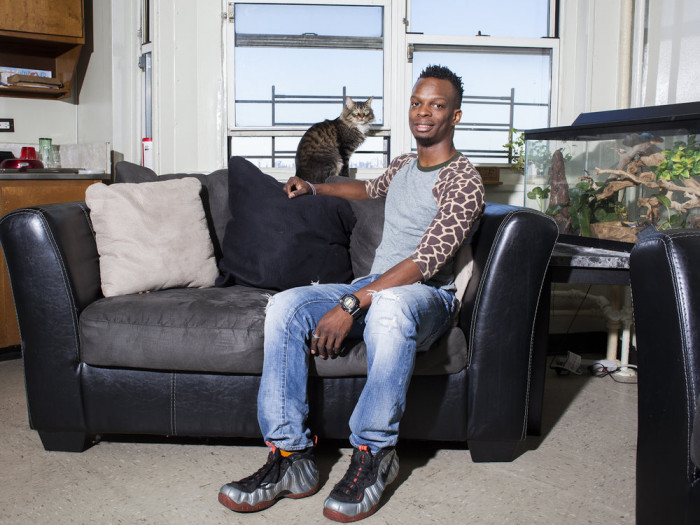 He photographs men in their homes and also on the street—as long as their feline friends accompany them, of course!