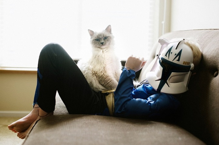 The photographer shares her experience that led to this series on her website and says, “At some point, I realized I was taking quite a few pictures of my boys and their cats.”