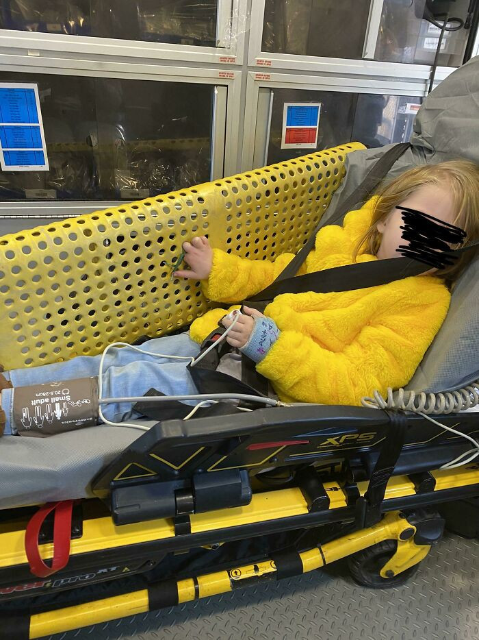 Kid's fingers got stuck in a bench... she's alright, but the bench probably isn't.