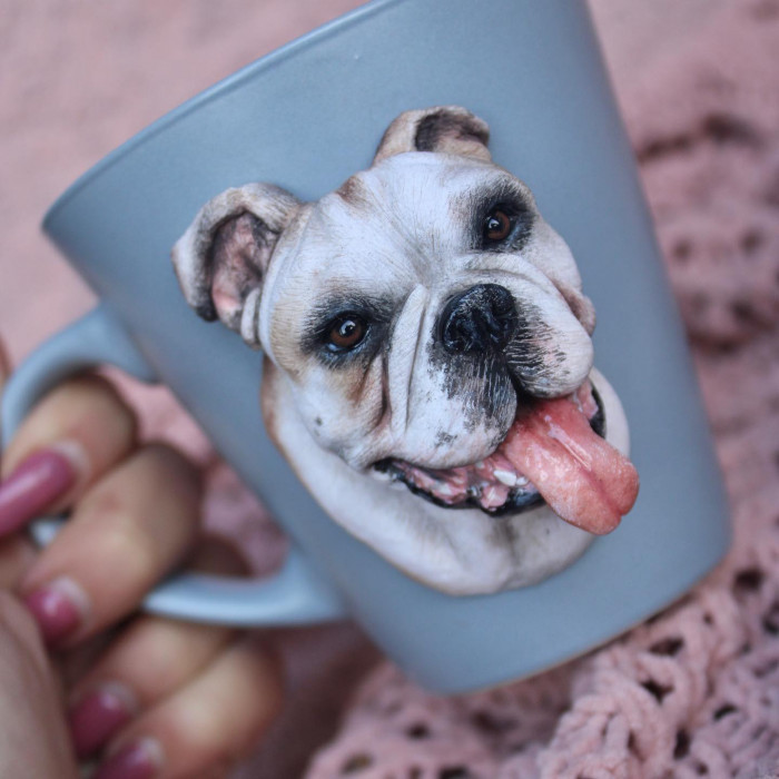 Polymer clay Bulldog mug with lifelike texture, cat detail on adjacent piece