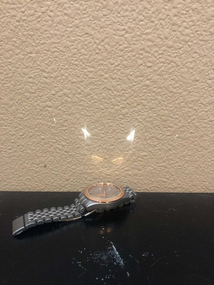 "The Reflection of This Watch Looks Like a Logo for Some Cat Superhero."
