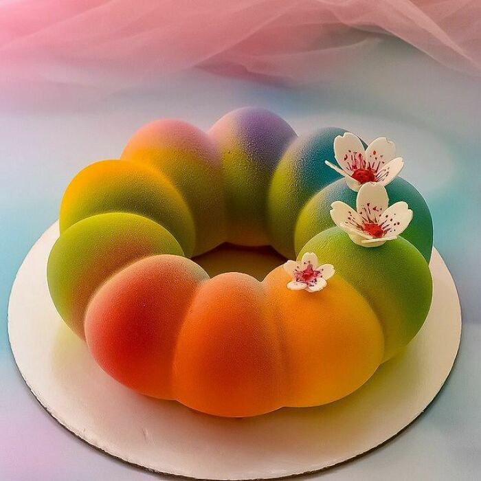 51. Fluffy rainbow-colored cake