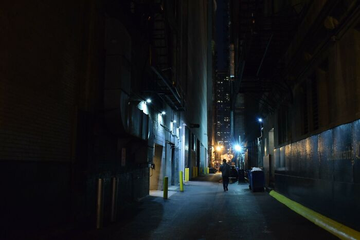 A chalk muralist worked on walkway early in the morning.