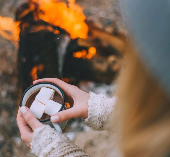 A redditor's Christmas celebrations involve the whole family with a bonfire near the freezing pond, with alcohol to warm everyone (who is of drinking age) up.