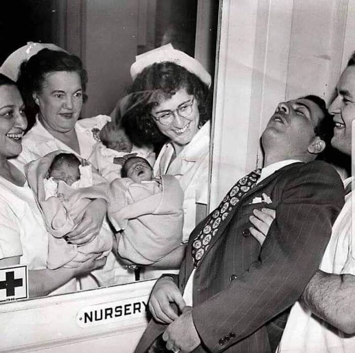 23. Nurses Excitedly Showing A Set Of Newly Born Triplets To A Surprised Father In A New York City Hospital, 1946