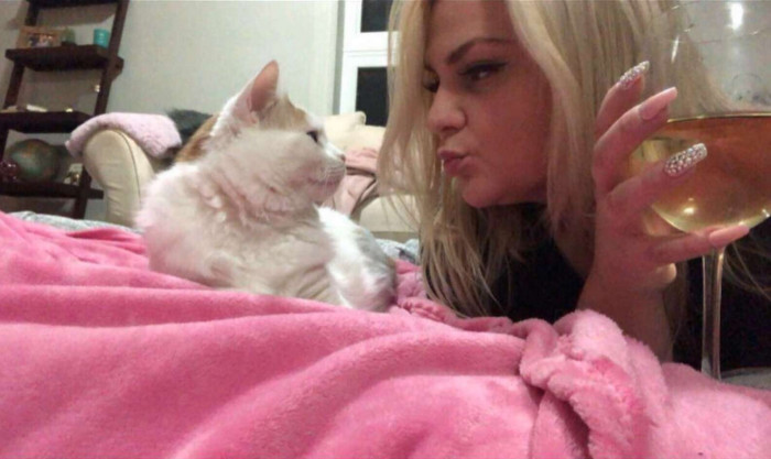 Woman Caught On Camera Doing Something Quite Unorthodox And Weird To Her Cat