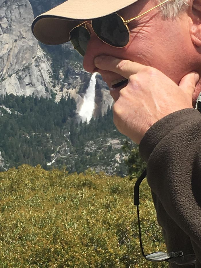 42. Dad taking a nice picture with the waterfall in Yosemite