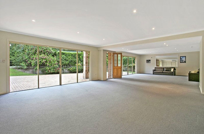 Lots of light? Check. Clean carpet? Check. Potential to convert into a bowling alley? Double check.