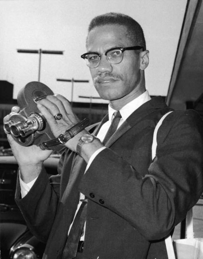 Human rights activist Malcom X pictured here in 1964 at the London Airport
