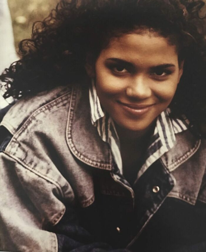 #21 Young Halle Berry with her natural, long curls.
