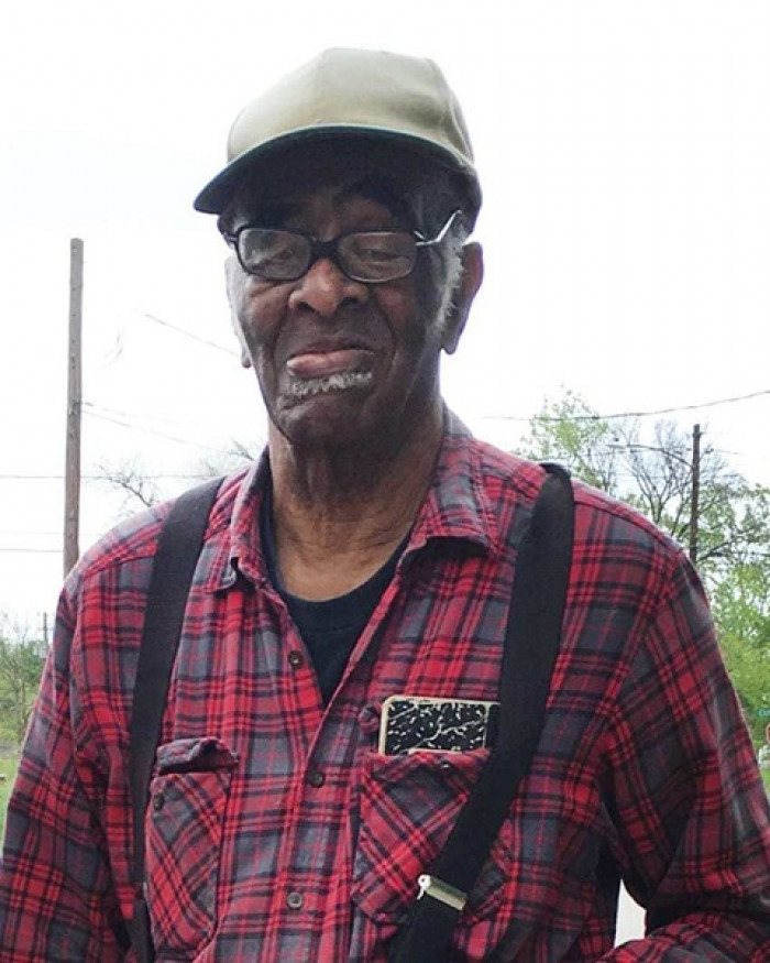 This is Calvin, the 89-year-old owner of the dog in the photo.